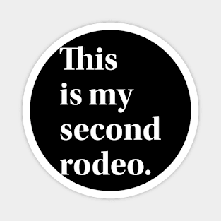 "This is my second rodeo." in plain white letters - cos you're not the noob, but barely Magnet